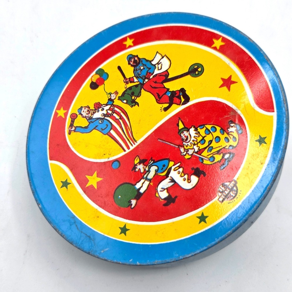 1940s U.S. MFG Co Metal Toy Clown with‎ Stars Spinner Noise Maker